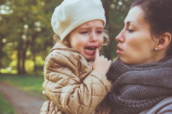 How Our Children Help Us Reparent Ourselves | Conscious Parenting & Healing Parent comforting upset child outdoors illustrating emotional regulation, safe attachment, and reparenting through parenting.